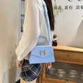 Bow style shoulder handbag