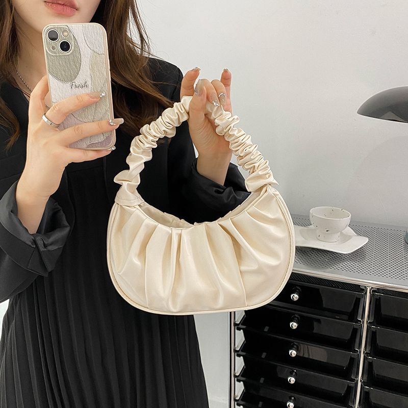 Cloud shaped handbag