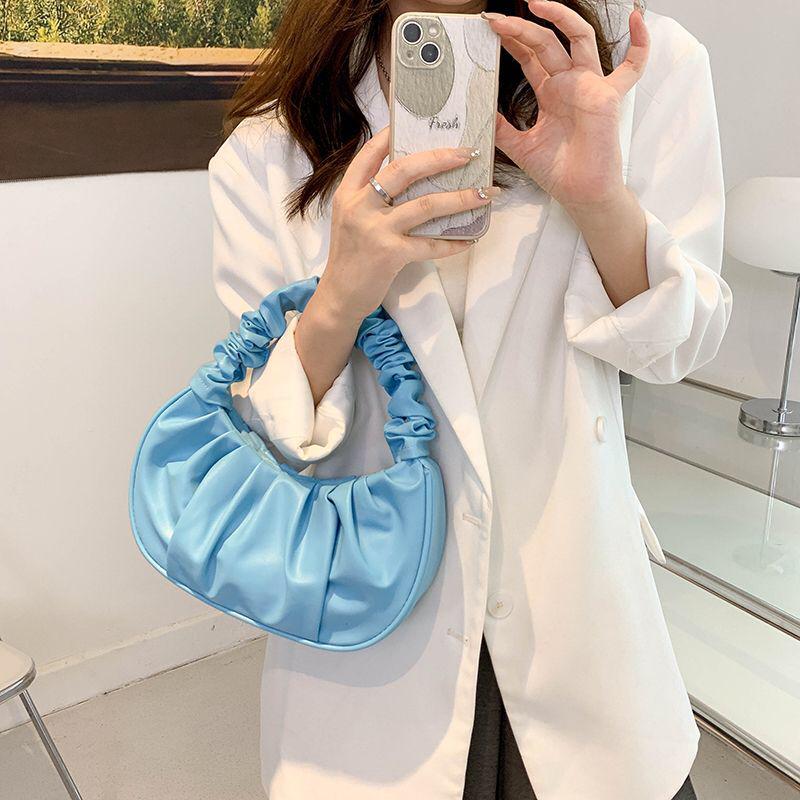 Cloud shaped handbag